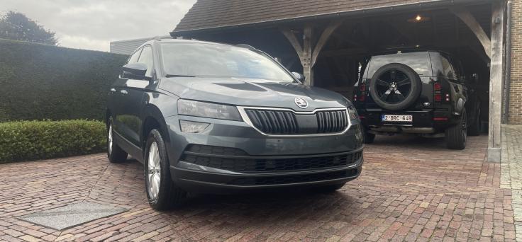 2dehands Skoda Karoq 1,0 TSI- auto airco-adaptieve cruise control-camera-GPS-lijn assist-pdc v+a verwarmde zetels-bj2022 met 60510 km